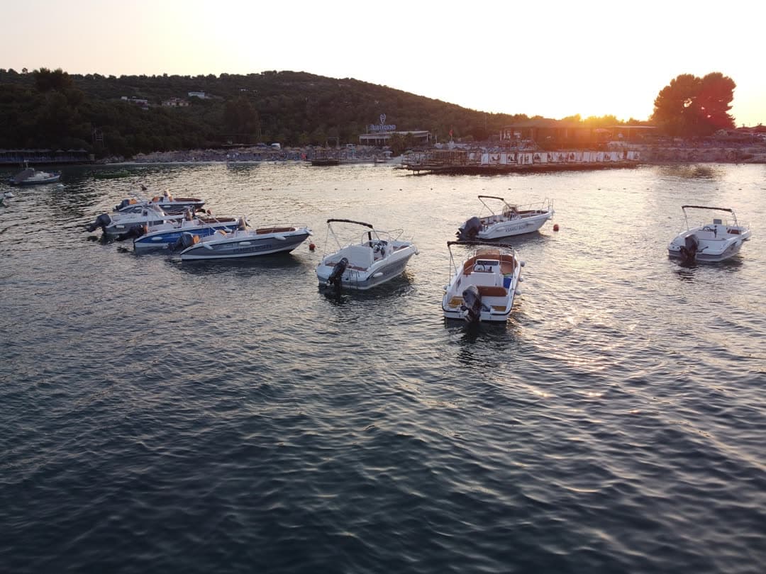 The fleet from above, spread across the cove